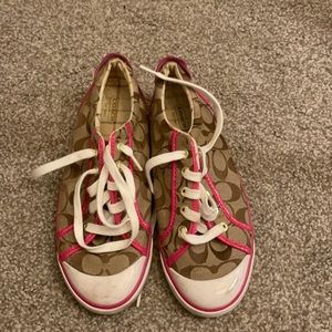 Pink and white coach shoes
